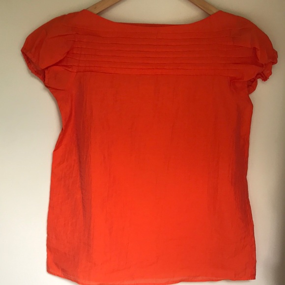 A Theory Top. - Picture 1 of 3